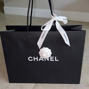 CHANEL paper bag with flower and bow